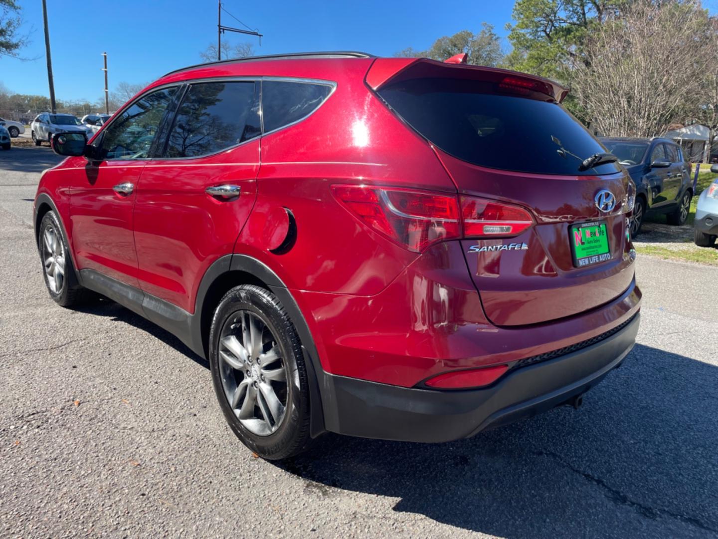 2013 RED HYUNDAI SANTA FE SPORT 2.0T (5XYZU3LA3DG) with an 2.0L engine, Automatic transmission, located at 5103 Dorchester Rd., Charleston, SC, 29418-5607, (843) 767-1122, 36.245171, -115.228050 - Leather, CD/AUX/Sat/Bluetooth, Dual Climate, Power Everything (windows, locks, seats, mirrors), Heated Seats, Rear Heated Seats, Push Button Start, Keyless Entry, Alloy Wheels. Local Trade-in!! Located at New Life Auto Sales! 2023 WINNER for Post & Courier's Charleston's Choice Pre-owned Car Dealer - Photo#4